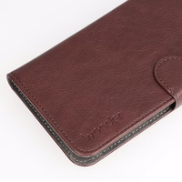 Wonder Common universaalne raamatümbris (XL) Samsung A12/A13 4G/A34 5G/A02S/Xiaomi Redmi 12 4G/12C/Note 12 4G pruun