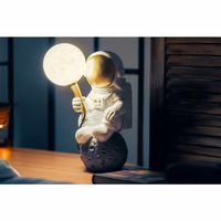 Moon laua lamp ASTRONAUT sitting Kunst Deco (mudel 4) AMTL