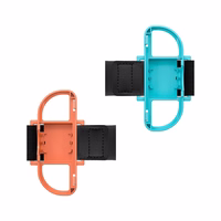 Nintendo Lüliti 23-in-1 Family Accessory Pakk 2 - oranž and sinine Komplekt