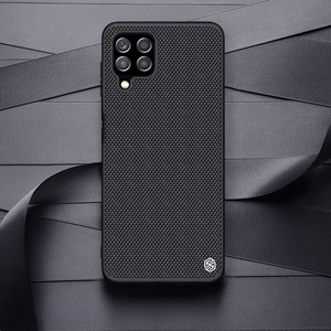 Nillkin Textured Case vastupidav tugevdatud ümbris koos geelraami ja nailonist tagaküljega Samsung Galaxy A22 4G mustale küljele