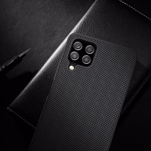 Nillkin Textured Case vastupidav tugevdatud ümbris koos geelraami ja nailonist tagaküljega Samsung Galaxy A22 4G mustale küljele