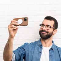 Dux Ducis Grit nahast ümbris iPhone 14 Plus'ile Elegantne kunstnahast ümbris (MagSafe ühilduv) Pruun