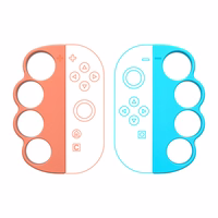 Nintendo Lüliti 23-in-1 Family Accessory Pakk 2 - oranž and sinine Komplekt