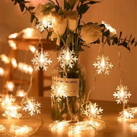 Lampki choinkowe LED snowflake/star -    3m/20 lampek ciepłe białe/warm valge zasilane bat. 3xAA EHD-LS04