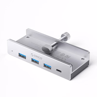 Orico MH4PC jaotur klamberkinnitusega USB-C / 3x USB-A 3.0 + 1x USB-C 3.0 - hõbedane