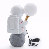 Moon laua lamp ASTRONAUT sitting Kunst Deco (mudel 4) AMTL