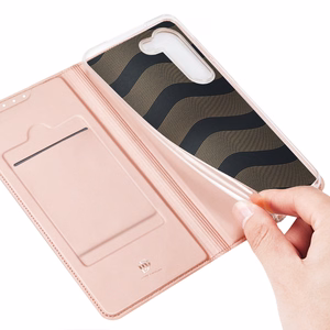 Dux Ducis Skin Pro ümbris jaoks Samsung Galaxy S23+ flip cover card wallet stand roosa