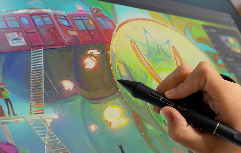 Lähivaates hoiab käsi pliiatsit ja loob graafikatahvlil värvilist illustratsiooni.