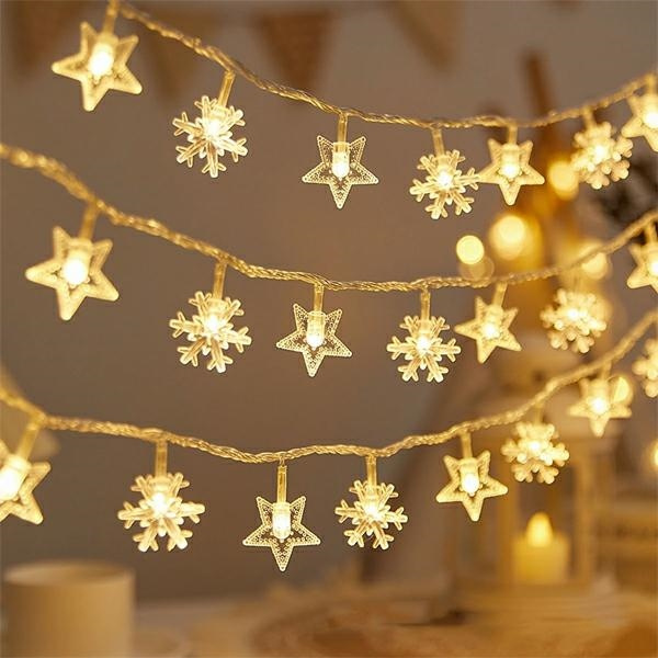 Lampki choinkowe LED snowflake/star -    3m/20 lampek ciepłe białe/warm valge zasilane bat. 3xAA EHD-LS04